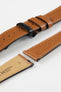 Hirsch Giffone gold brown leather strap paired with a black sport deployment clasp and quick-release pins.