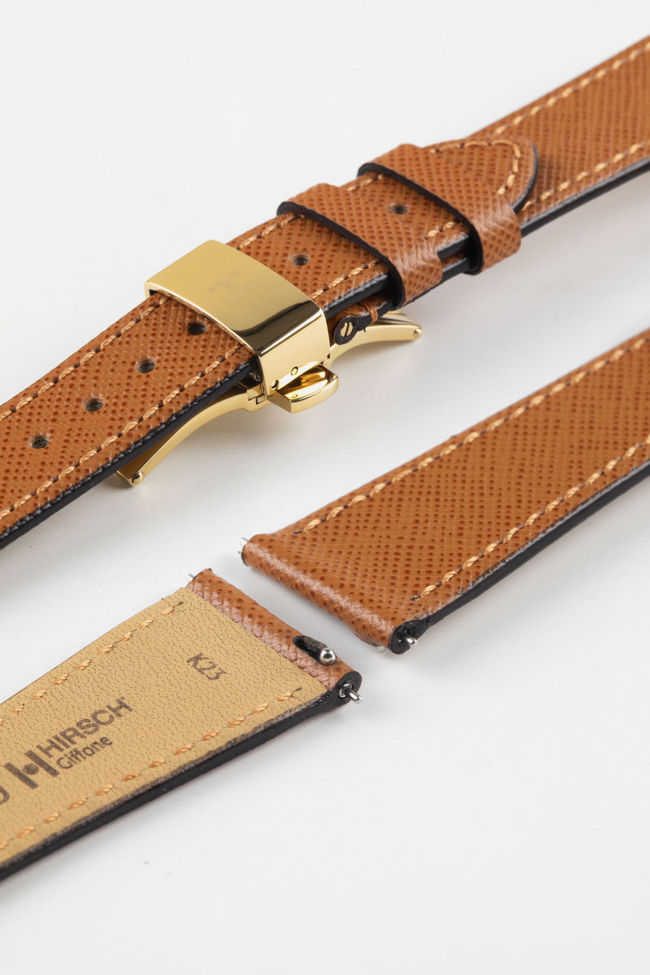 Hirsch Giffone gold brown leather watch strap fitted with a gold push-button deployment clasp.
