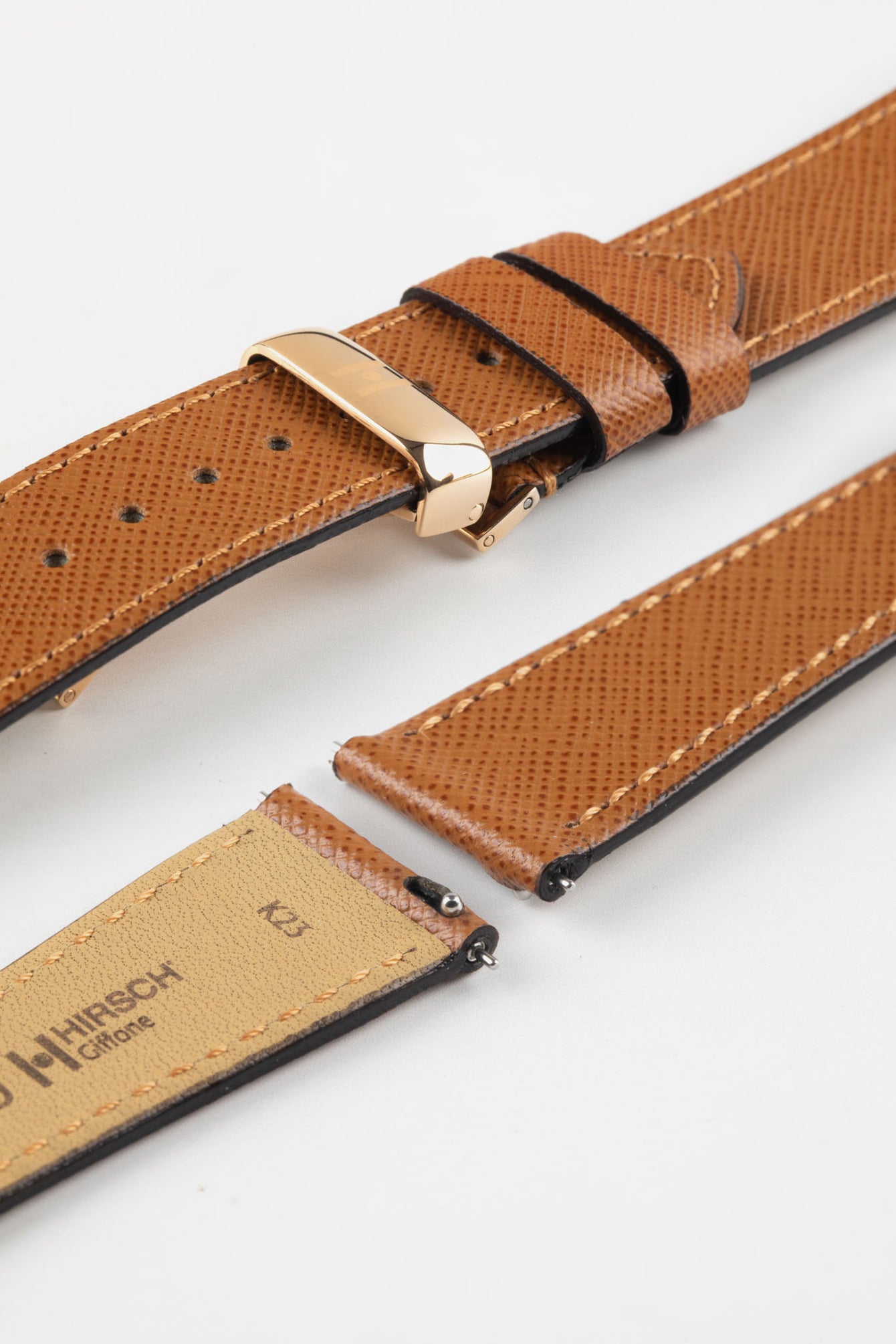 Hirsch Giffone gold brown leather strap paired with a rose gold sport deployment clasp and quick-release pins.
