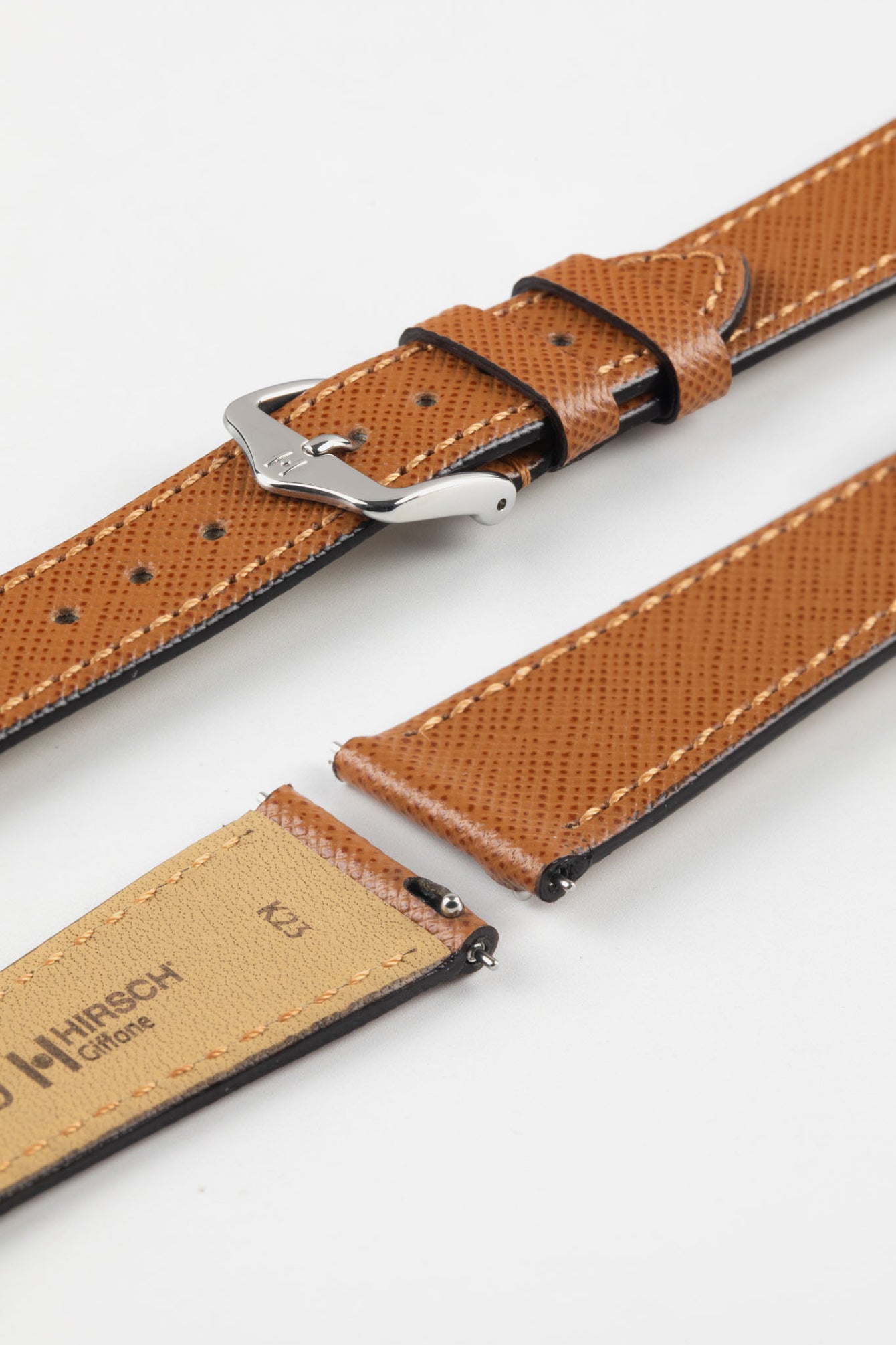 Hirsch Giffone gold brown leather strap with quick-release spring bars and a traditional silver pin buckle.