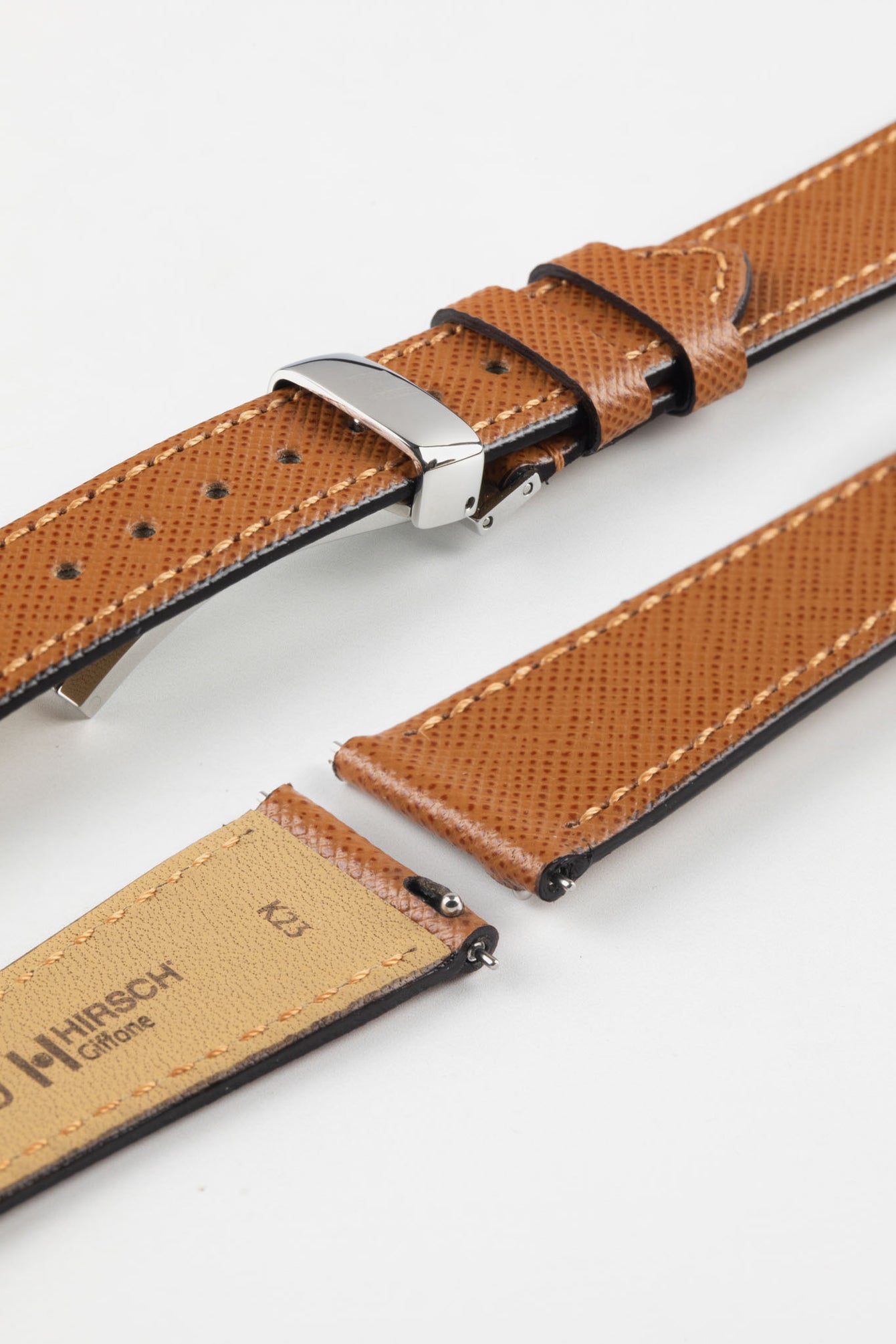 Hirsch Giffone gold brown leather strap paired with a silver sport deployment clasp and quick-release pins.