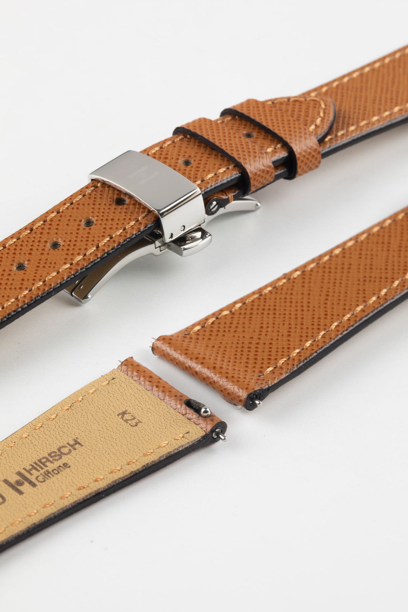Hirsch Giffone gold brown leather watch strap fitted with a silver push-button deployment clasp.