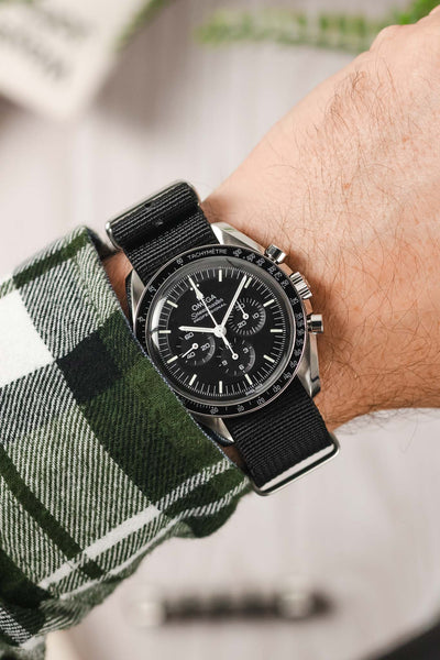 Black watch strap fitted to Omega Speedmaster Watch