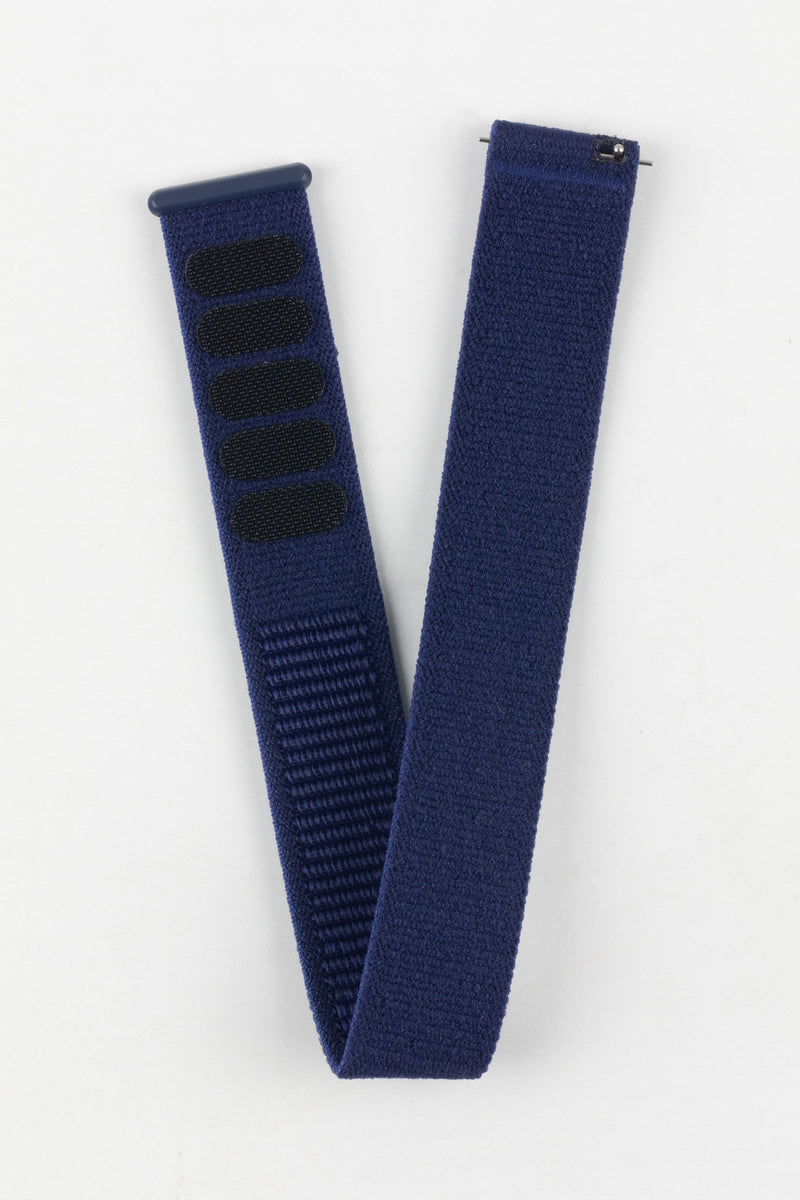 Full view of the HIRSCH Vocem Blue textile watch strap with hook-and-loop fastening pads and quick-release pins.