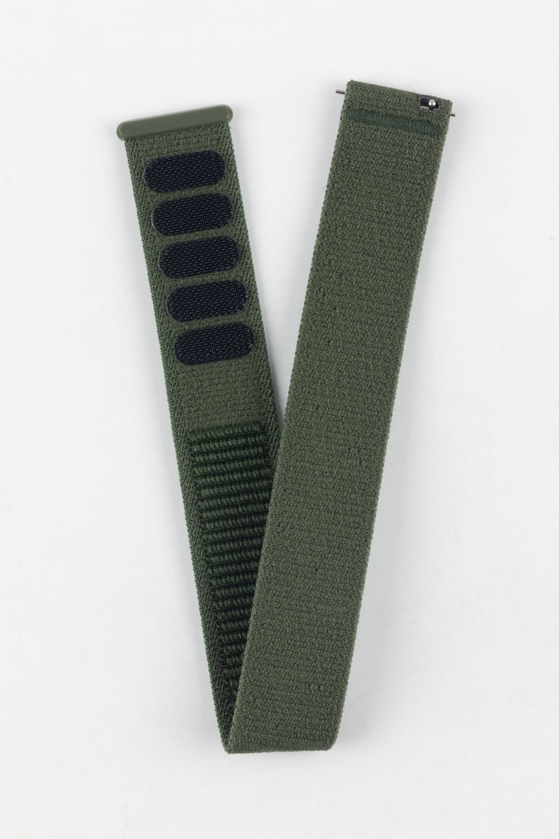 Full view of the HIRSCH Vocem Green textile watch strap with hook-and-loop closure for quick watch changes.