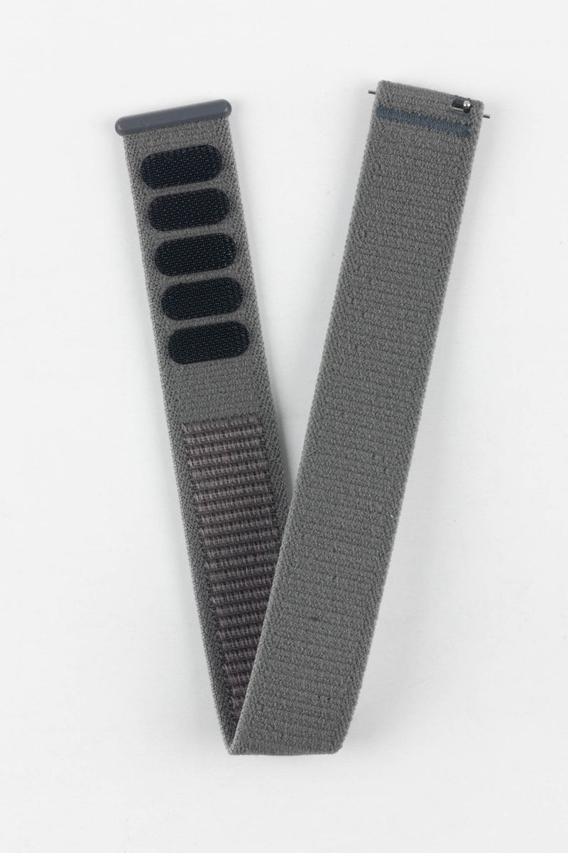 Full view of HIRSCH Vocem Grey textile quick-change watch strap with hook-and-loop closure design.