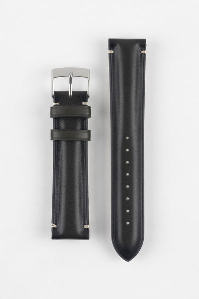 Two black leather watch strap pieces displayed vertically on a light grey background. One strap section features a polished silver buckle with a tang closure and two leather keepers, while the other section shows a tapered end with a row of evenly spaced adjustment holes. The leather has a smooth, slightly grained texture with subtle light stitching near the lugs.