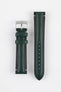 Two dark green leather watch strap pieces displayed vertically on a light grey background. One strap section features a polished silver tang buckle with an engraved logo and two leather keepers, while the other shows a tapered end with a row of evenly spaced adjustment holes. The leather has a smooth, slightly pebbled finish with subtle light stitching near the lugs.