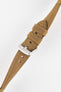 Tan-brown leather watch strap with yellow stitching, shown in angled close-up with a silver buckle and adjustment holes.