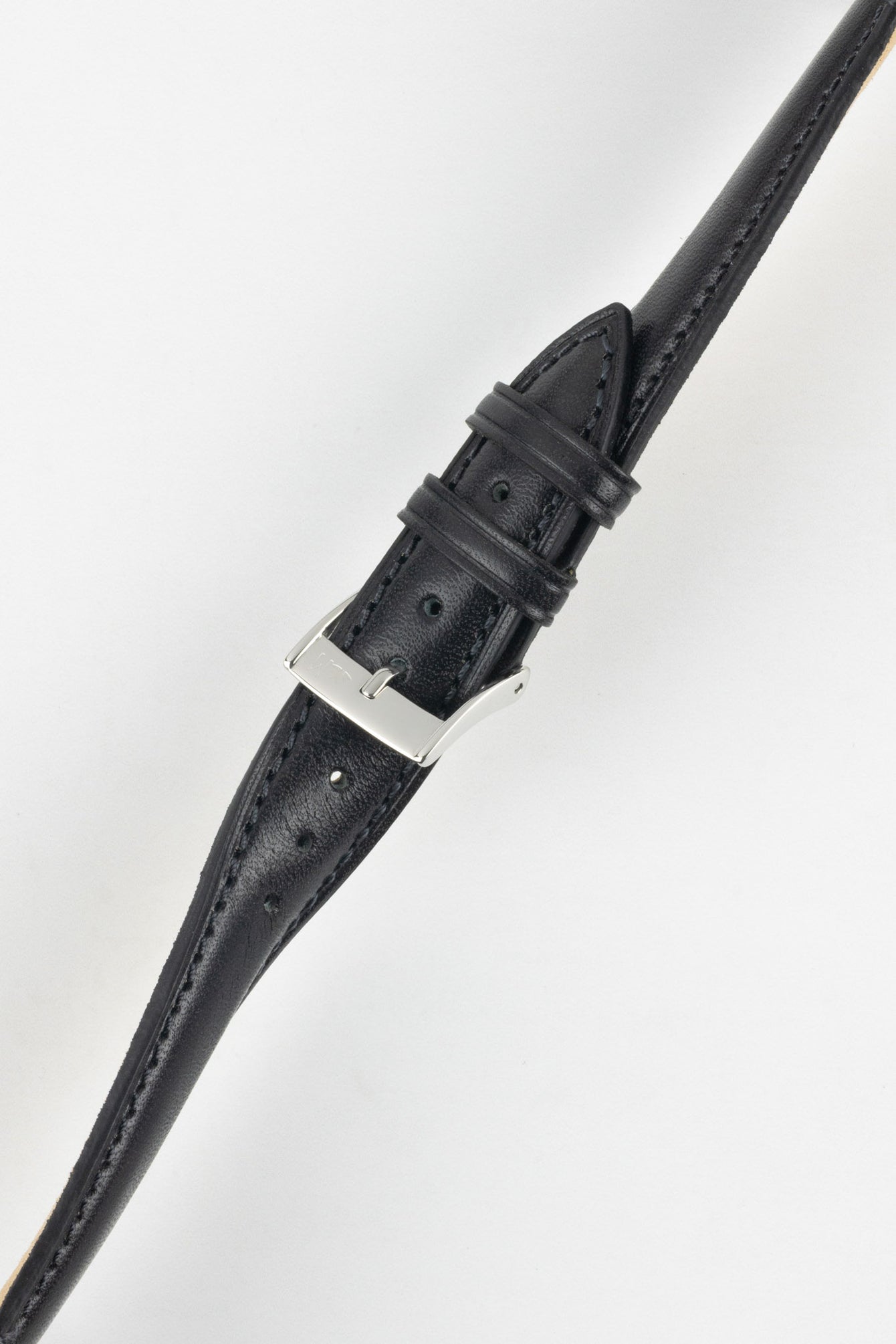 Black leather watch strap with black stitching, shown in angled close-up with a silver buckle and adjustment holes.