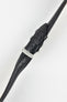 Black leather watch strap with black stitching, shown in angled close-up with a silver buckle and adjustment holes.