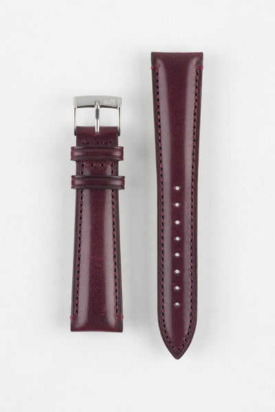 Burgundy leather watch strap with matching stitching, shown vertically with a silver buckle and adjustment holes on a light grey background.