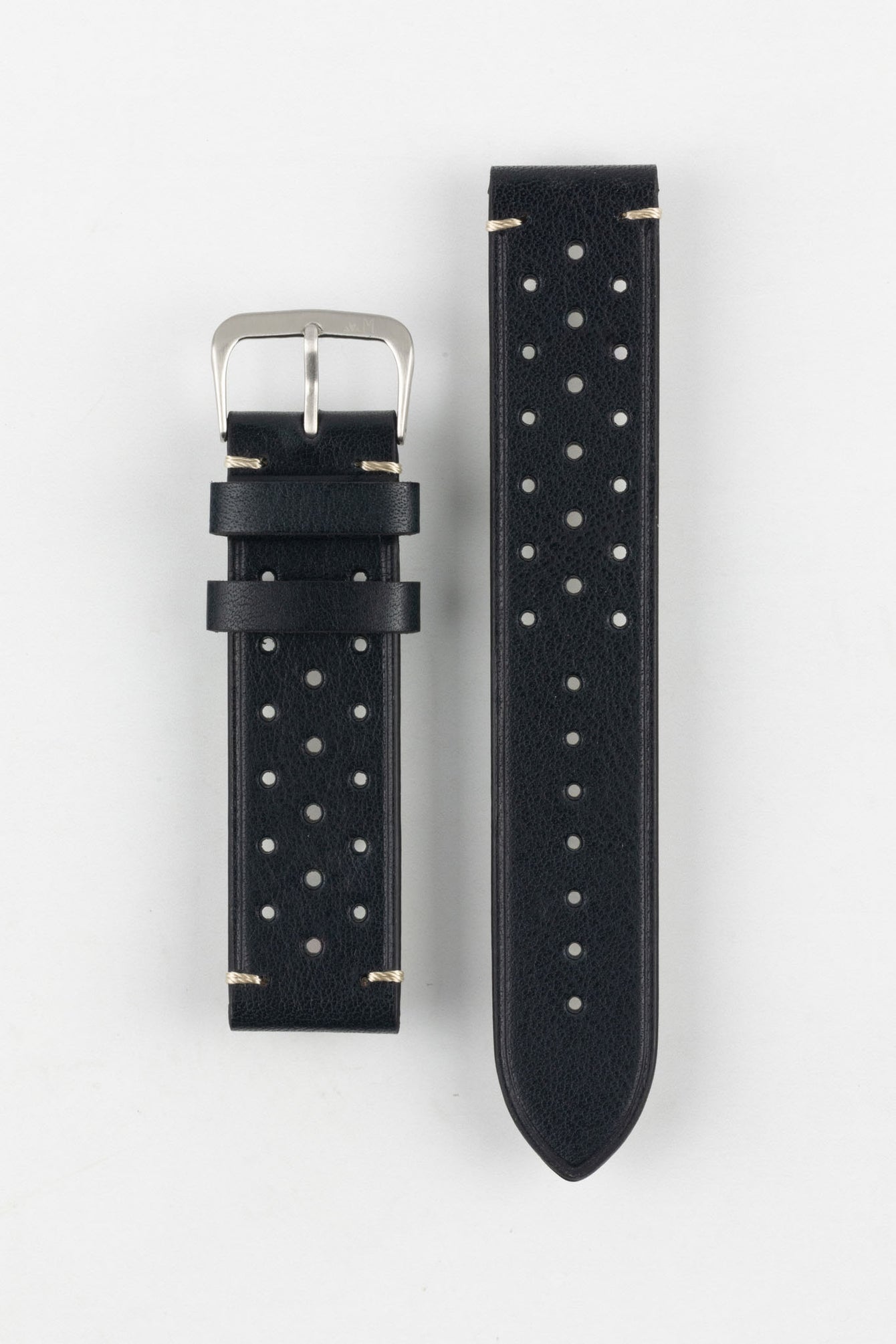 
A high-angle studio shot of a black Morellato Brahms watch strap with white stitching and a stainless steel buckle, laid flat against a white background. The strap features a rally-style design with two rows of perforations.