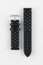 
A high-angle studio shot of a black Morellato Brahms watch strap with white stitching and a stainless steel buckle, laid flat against a white background. The strap features a rally-style design with two rows of perforations.