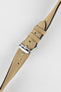 Angled view of Morellato SCHUMANN beige suede watch strap, showing buckle and strap holes. High-quality watch band.