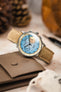Morellato SCHUMANN beige suede watch strap with Studio Underd0g Bicompax ST-1901 watch on table. Find your next watch band.