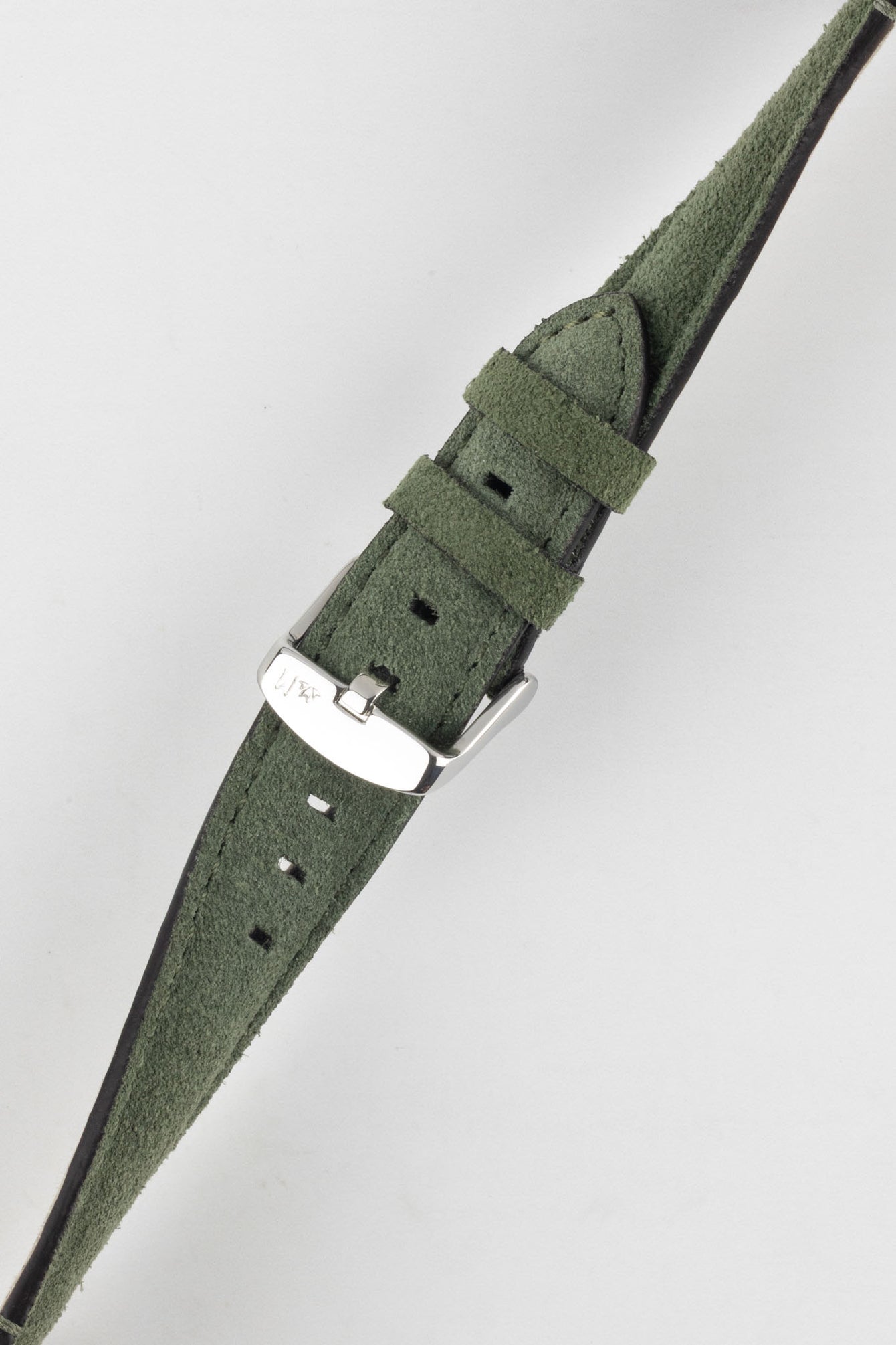 Angled view of Morellato SCHUMANN green suede watch strap. Discover luxurious and comfortable watch accessories online.