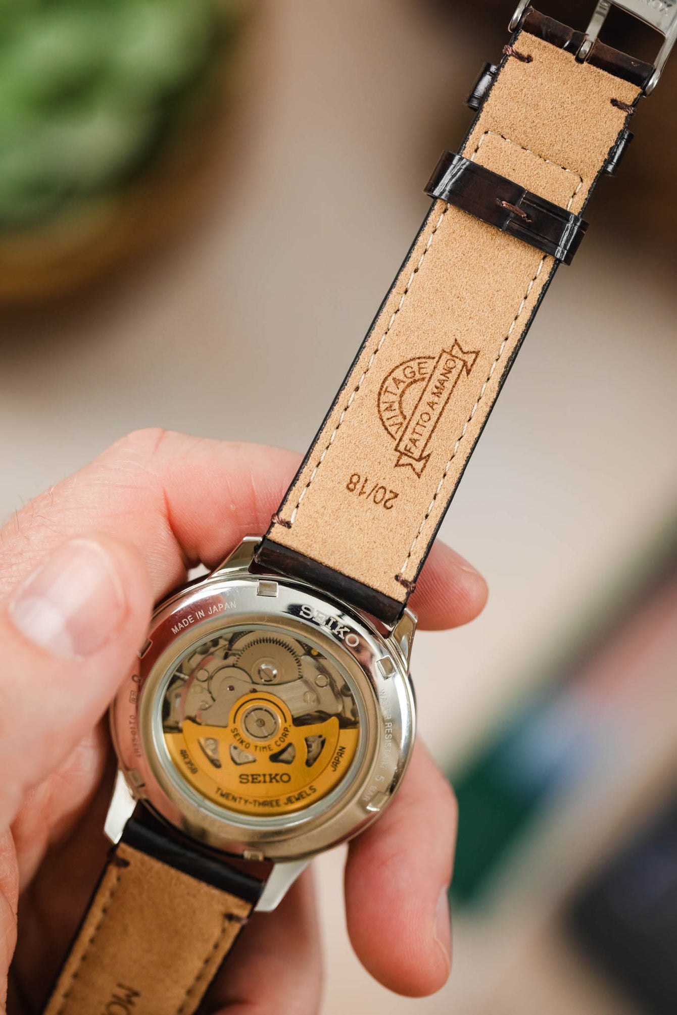The back of a Seiko watch with the high-quality brown Morellato Tiepolo watch strap, highlighting the inner lining.