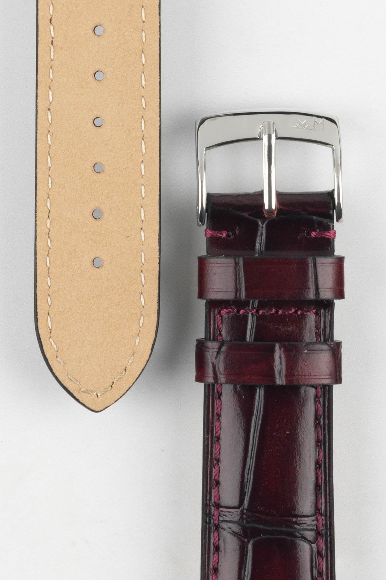 A close-up of the burgundy Morellato Tiepolo watch strap, highlighting the textured leather and polished buckle.