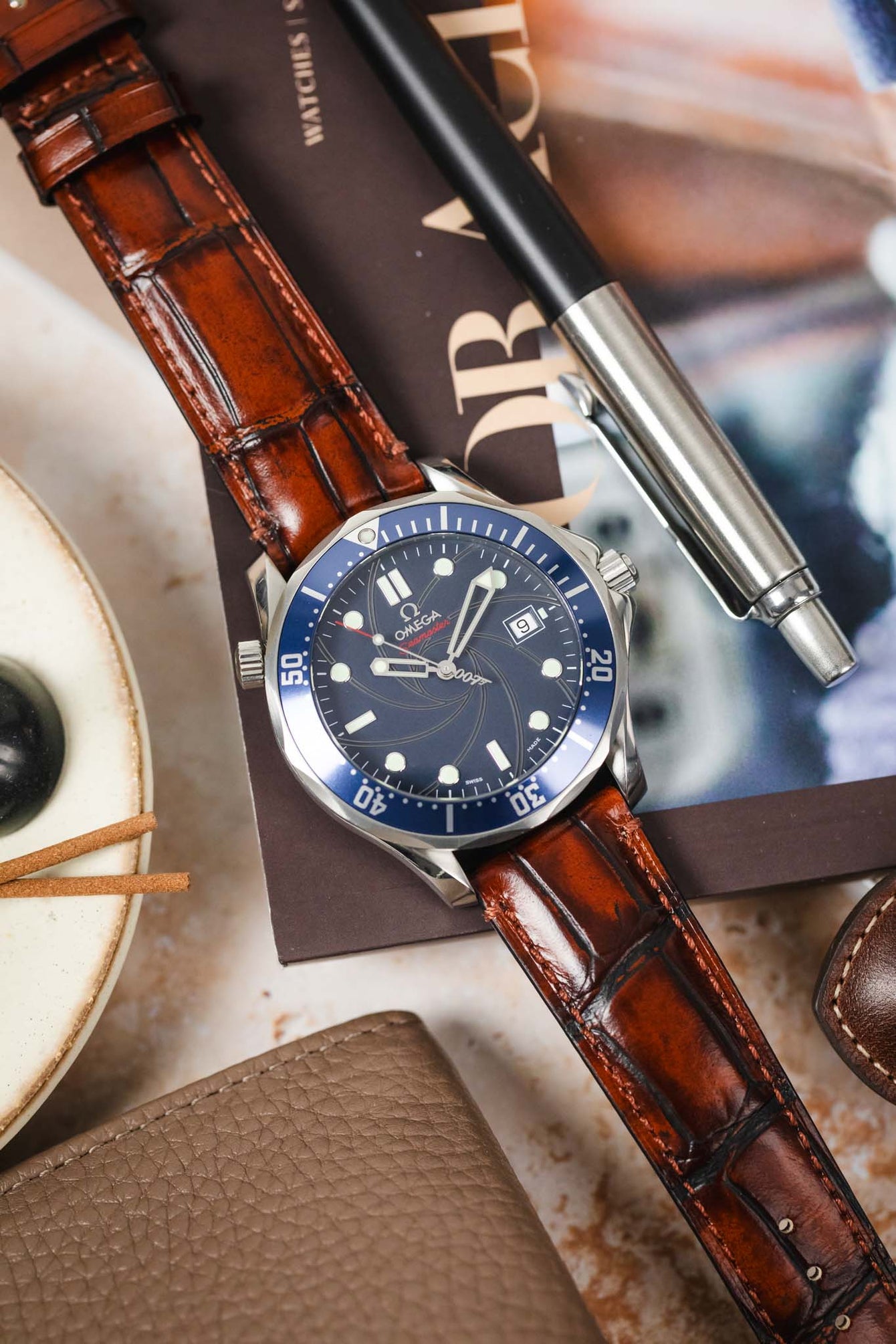 ight brown Morellato Tiepolo watch strap on an Omega Seamaster watch, a perfect combination for a watch lover.