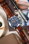 ight brown Morellato Tiepolo watch strap on an Omega Seamaster watch, a perfect combination for a watch lover.