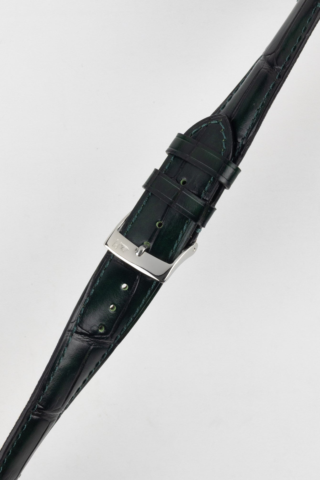Green Morellato Tiepolo watch strap, showcasing its fine crocodile grain and elegant design on a white background.