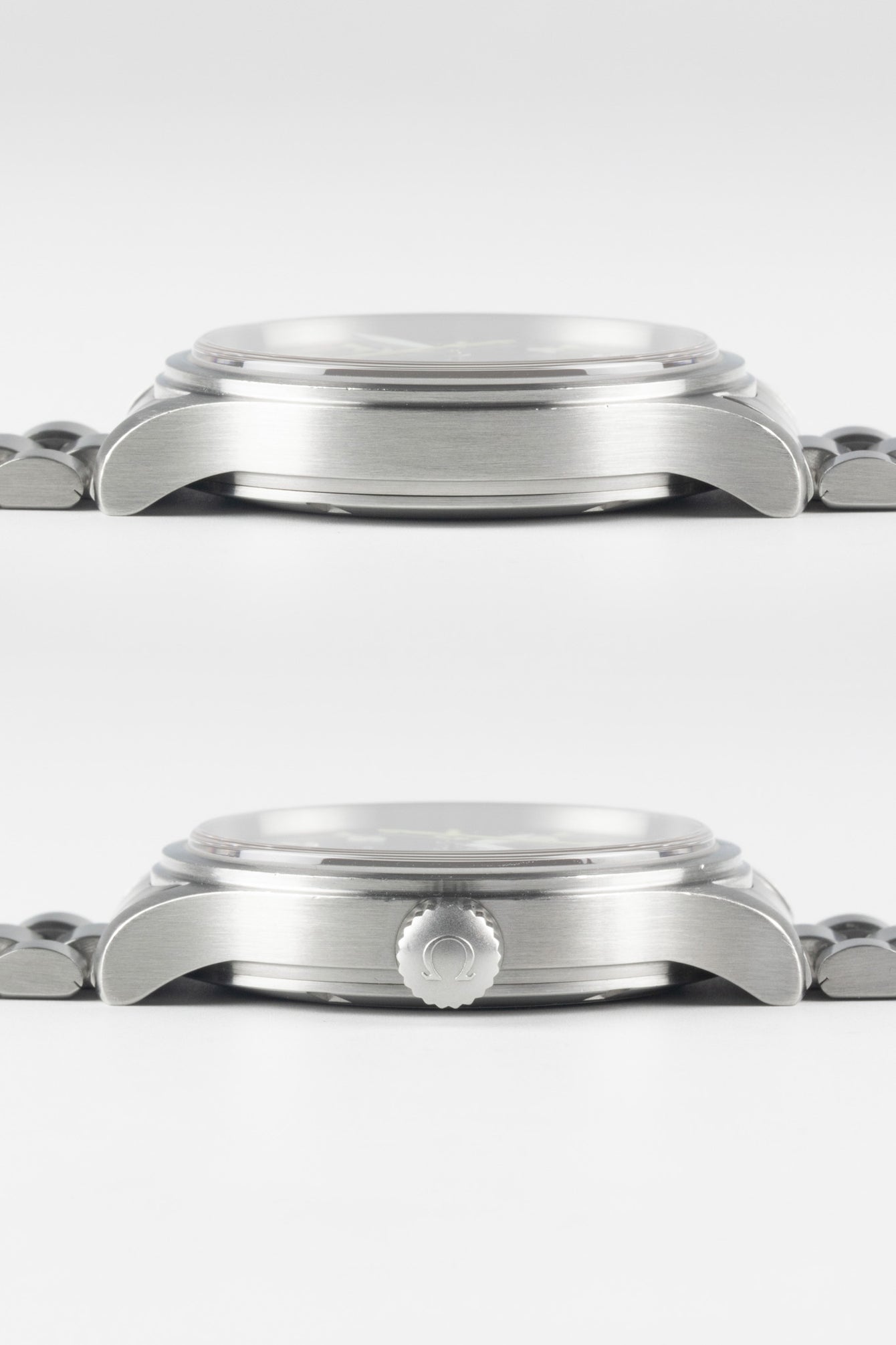 Two side-profile views of the watch case. The top view shows the smooth side, while the bottom view shows the screw-down crown embossed with the Omega logo.