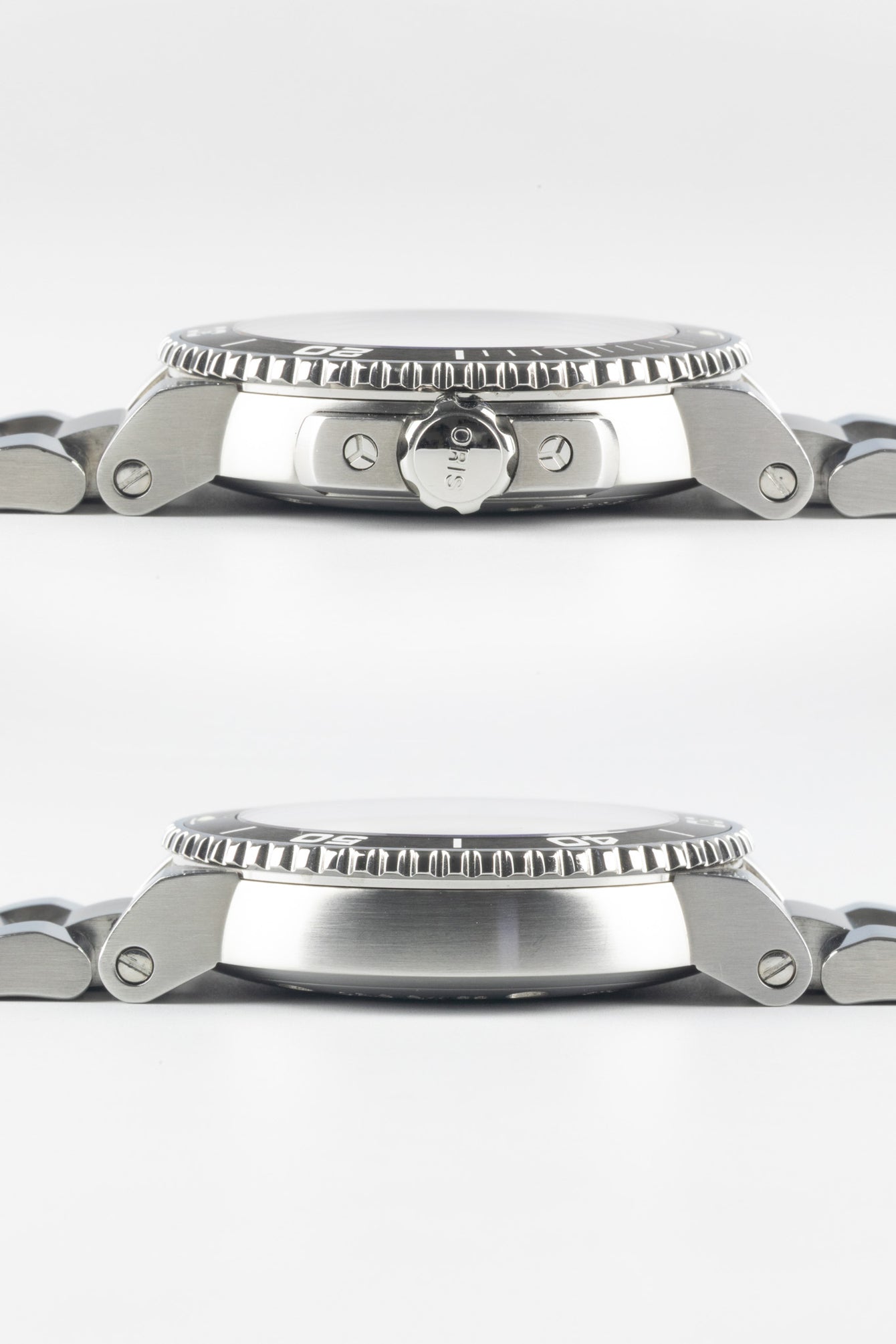 Two horizontal side-profile views of an Oris Aquis Date watch case; the top shows the "ORIS" signed crown and guards, while the bottom shows the smooth, brushed steel side profile.