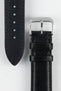 Close up of black RIOS1931 Merino Leather strap with polished stainless steel buckle and leather keepers, showing underside of strap