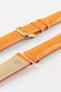 A product shot of an orange crocodile-embossed leather watch strap with a gold-plated buckle and white contrast stitching. The two separate pieces of the strap are laid diagonally on a plain white background, revealing the tan underside of one piece with the size "20/18" stamped on it.