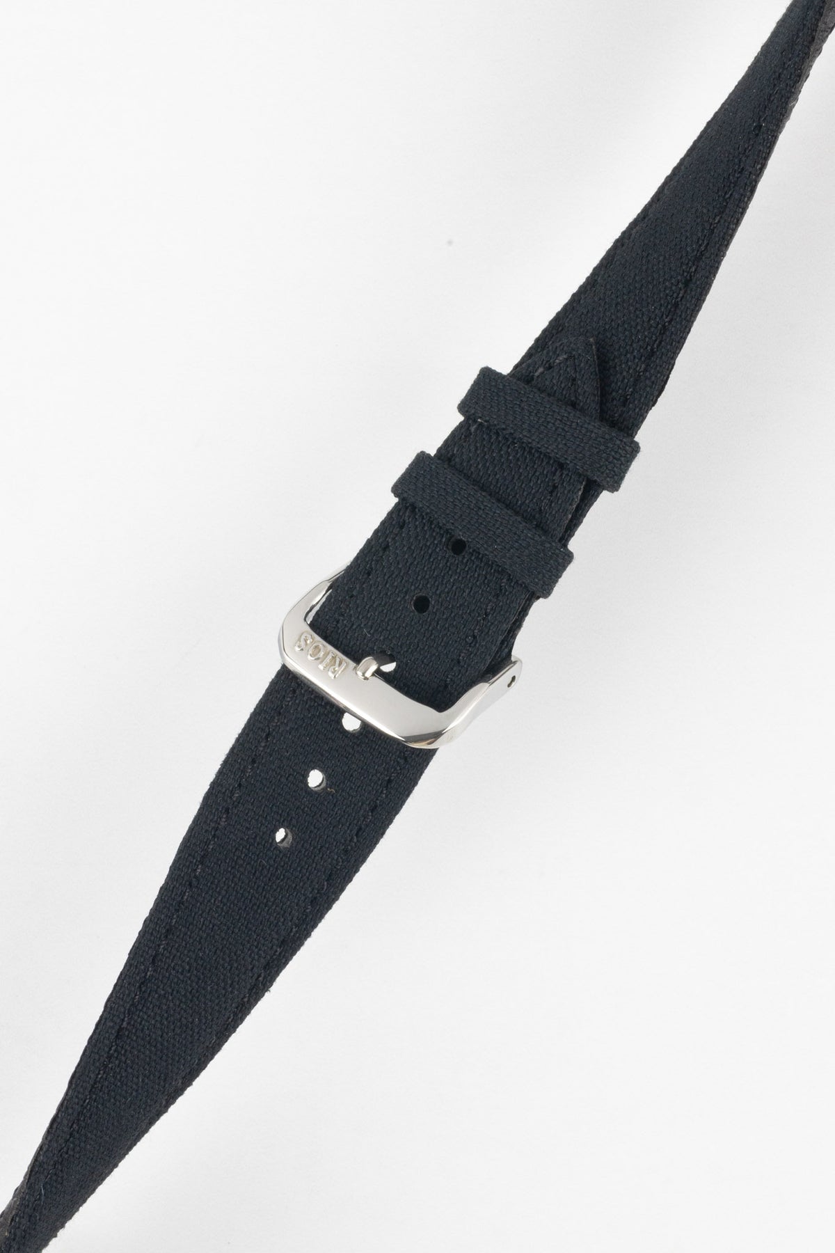 Dark navy fabric watch strap with a polished silver-tone buckle, shown against a light gray background. The close-up image highlights the textured woven material, adjustment holes, stitched edges, and matching fabric keepers, with the RIOS-branded buckle prominently displayed.