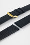 Close-up product image of a dark navy watch strap with a polished gold buckle. The strap is shown in separated sections, highlighting the fabric exterior, stitching details, adjustment holes, and textured leather underside against a light gray background.