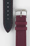 Close-up view of a burgundy fabric watch strap showing both sides on a light gray background. The woven fabric upper section features a polished silver-tone RIOS-branded buckle and two matching fabric keepers, while the black textured leather underside displays burgundy contrast stitching, adjustment holes, and a pointed tip. The image highlights the strap’s materials, stitching details, and premium craftsmanship.