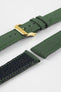 Olive green canvas watch strap with green contrast stitching, black leather lining, and a gold-tone RIOS1931 buckle, displayed on a white background.