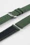 Olive green canvas watch strap with green contrast stitching, black leather lining, and a polished RIOS1931 stainless steel buckle, displayed on a white background.