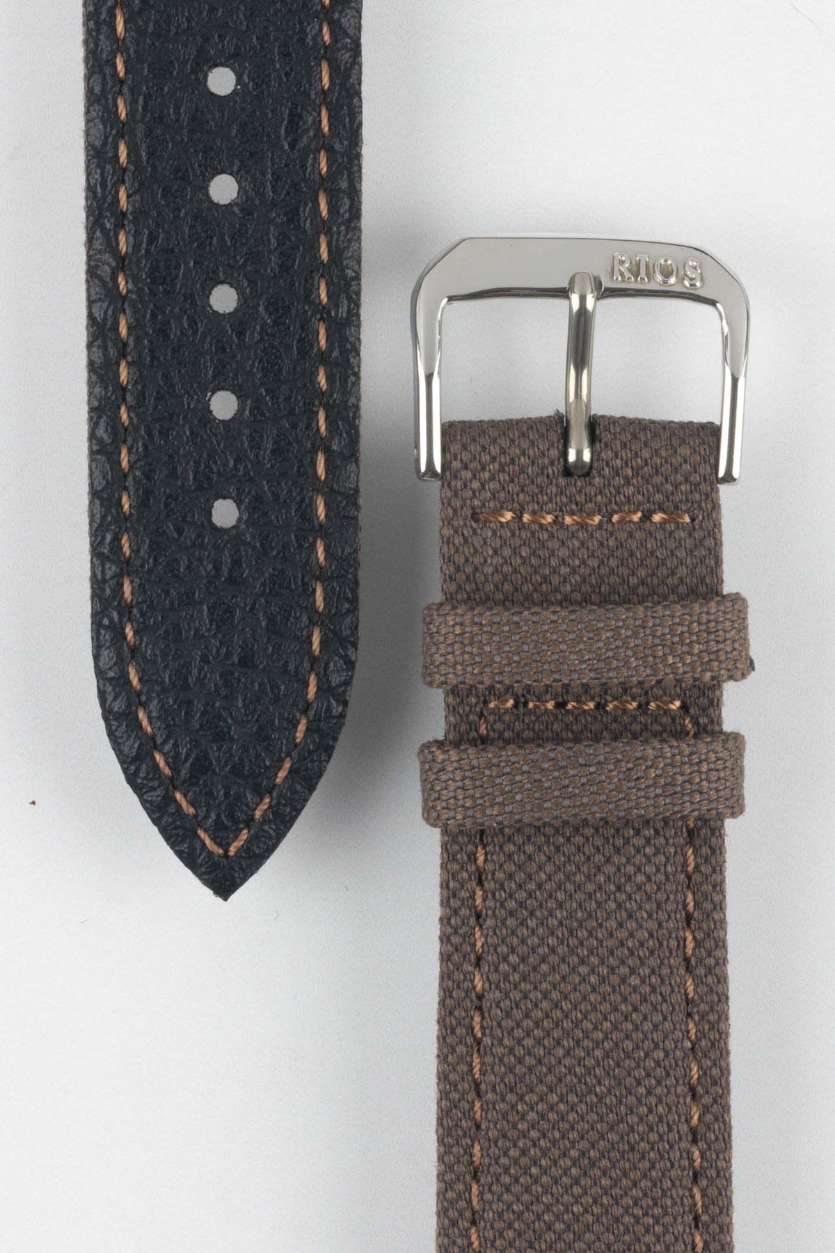Mocha brown fabric watch strap with a silver-tone RIOS buckle, shown alongside its black leather underside with contrast stitching and adjustment holes.