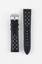 Product shot of a two-piece black perforated leather watch strap laid flat on a plain light background, featuring matching black stitching and a polished silver pin buckle on one end.