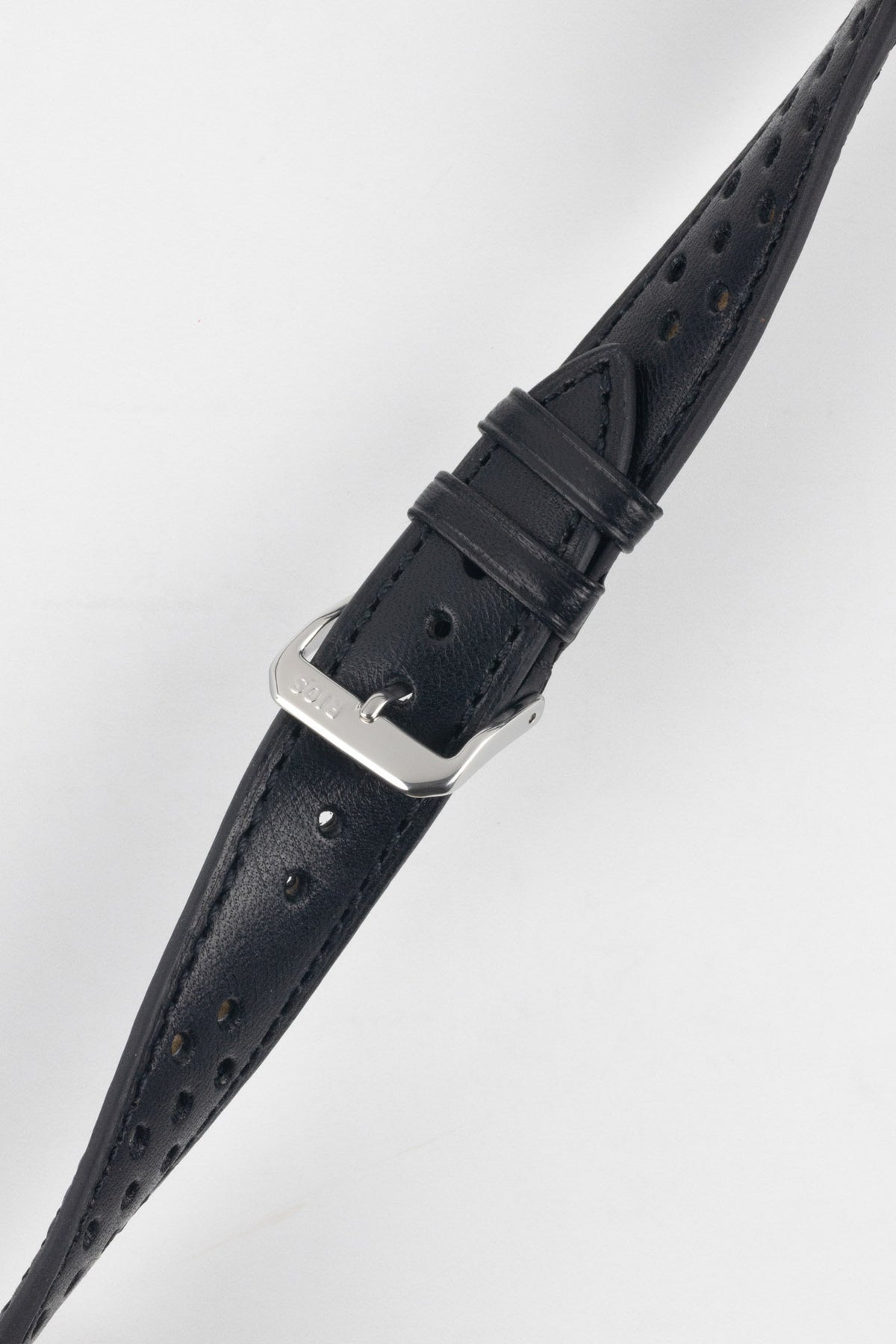 Black perforated leather rally watch strap with black stitching, dual keeper loops, multiple adjustment holes, a polished stainless steel RIOS buckle, and a tapered pointed tip, displayed diagonally on a light grey background to highlight the smooth leather finish, motorsport-inspired perforations, and premium handcrafted construction.