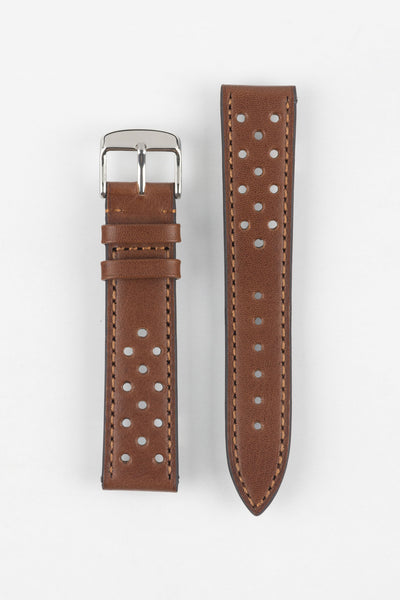 Product shot of a two-piece brown perforated leather watch strap laid flat on a plain light background, featuring contrast stitching and a polished silver pin buckle on one end.