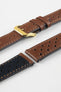 Close-up detail view of a cognac brown perforated leather rally watch strap displayed with one strap section detached, featuring matching brown stitching, multiple motorsport-inspired perforations, dual keeper loops, a polished gold-tone RIOS buckle, quick-release spring bars, and a black leather lining. Displayed on a light grey background to highlight the premium handcrafted construction, contrasting underside, and vintage racing-inspired design.