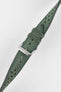 Forest green perforated leather rally watch strap with a soft nubuck-style finish, turquoise contrast stitching, dual keeper loops, multiple adjustment holes, a polished stainless steel RIOS buckle, and a tapered pointed tip, displayed diagonally on a light grey background to highlight the vintage motorsport-inspired design, premium handcrafted construction, and suede-like leather texture.