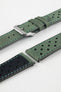 Close-up detail view of a forest green perforated leather rally watch strap displayed with one strap section detached, featuring a soft nubuck-style finish, turquoise contrast stitching, multiple motorsport-inspired perforations, dual keeper loops, a polished stainless steel RIOS buckle, quick-release spring bars, and a black leather lining. Displayed on a light grey background to highlight the premium handcrafted construction, contrasting underside, and vintage racing-inspired design.