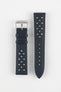 Two-piece ocean blue perforated leather rally watch strap with matching blue contrast stitching, a tapered pointed tip, dual keeper loops, multiple motorsport-inspired perforations, quick-release spring bars, and a polished stainless steel RIOS buckle, displayed flat on a light grey background to showcase the sporty vintage racing-inspired design and premium handcrafted leather construction.