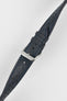 Ocean blue perforated leather rally watch strap with matching blue contrast stitching, dual keeper loops, multiple adjustment holes, a polished stainless steel RIOS buckle, and a tapered pointed tip, displayed diagonally on a light grey background to highlight the smooth leather finish, motorsport-inspired perforations, and premium handcrafted construction.