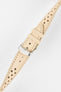 Close-up product shot of a beige perforated leather watch strap with visible stitching and a polished silver pin buckle. The strap is shown laid flat on a plain light background, highlighting the perforation pattern, stitching details, and buckle hardware.