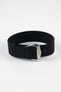 A three-quarter view of a black ribbed-nylon watch strap fastened into a loop, highlighting the brushed metal buckle and woven texture on a white background.