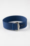 A three-quarter view of a blue ribbed-nylon watch strap fastened into a loop, highlighting the brushed metal buckle and woven texture on a white background.