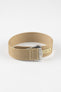 
Close-up of a light cream ribbed nylon watch strap arranged in a loop on a light grey background. The strap features a textured woven finish and a brushed silver deployant clasp with an engraved logo. A matching cream reinforced section with evenly spaced adjustment holes is visible near the clasp, highlighting the strap’s construction and minimalist design.