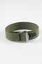 A three-quarter view of a green ribbed-nylon watch strap fastened into a loop, highlighting the brushed metal buckle and woven texture on a white background.