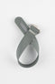 A top-down shot of a grey ribbed-nylon watch strap coiled into a loop against a white background, featuring a brushed stainless steel buckle with a circular logo.
